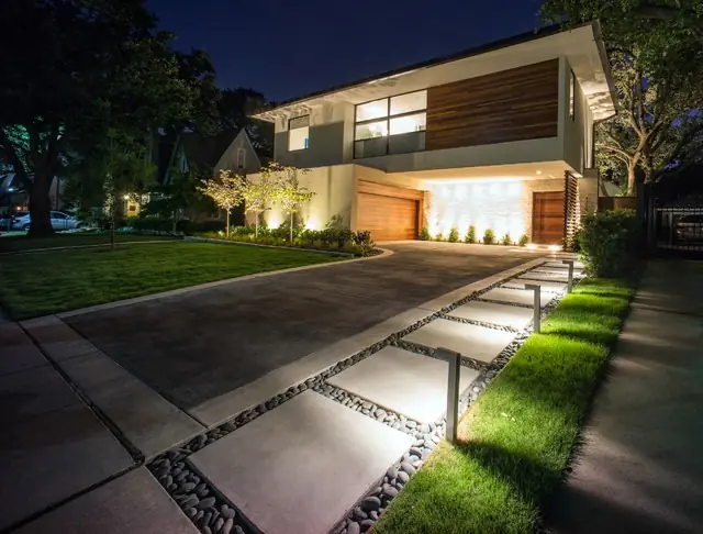Ripon home at dusk with landscape lighting on the walkway